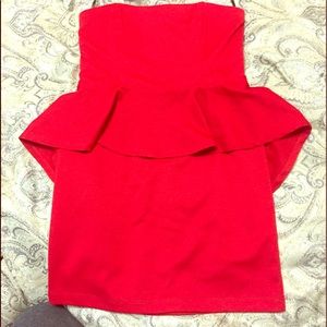 Strapless red dress with ruffle on waist